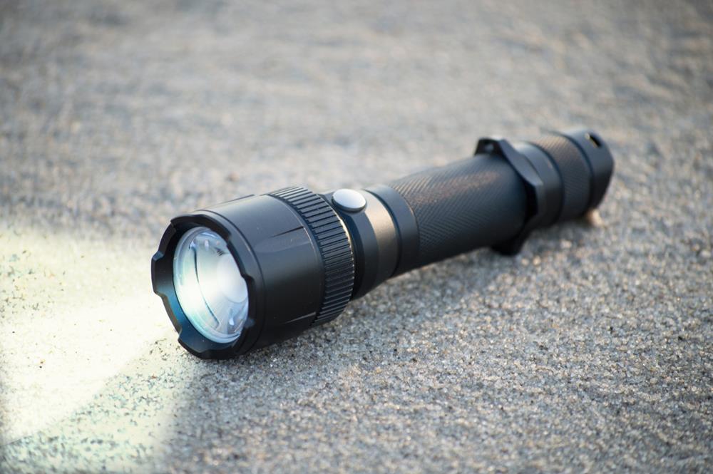 A flashlight on the ground