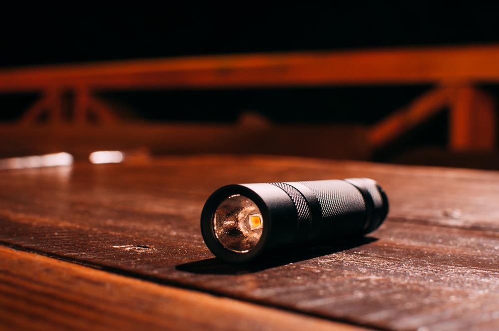 Torch on wooden table