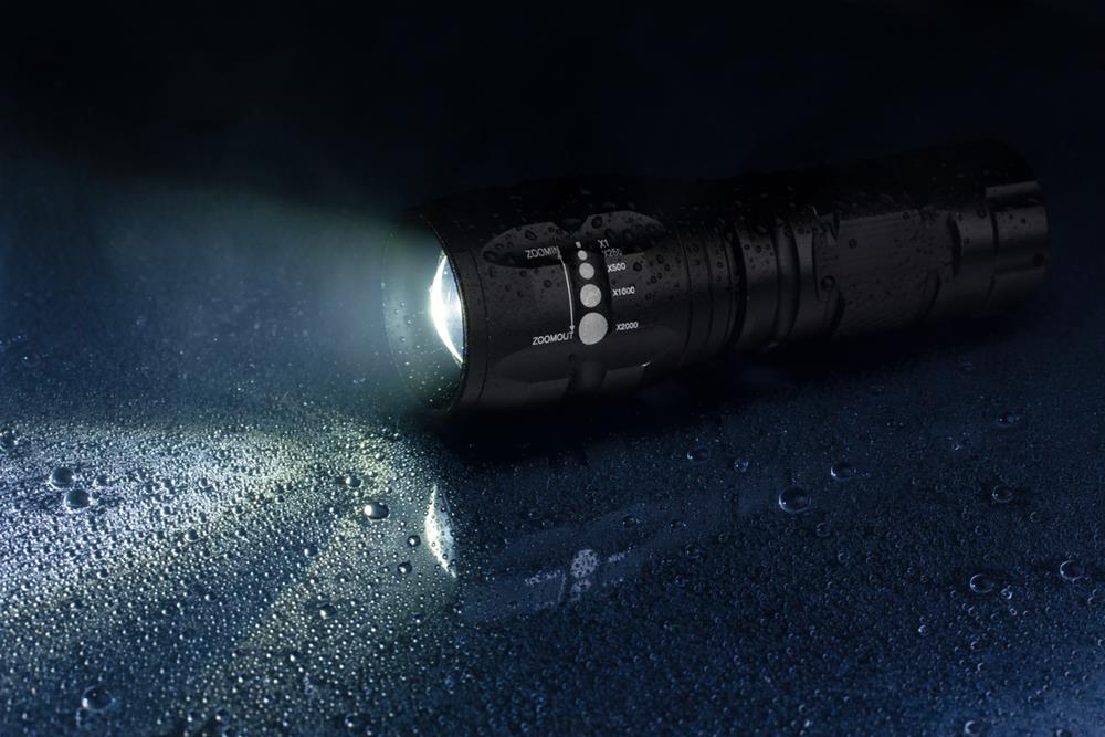 A waterproof tactical flashlight