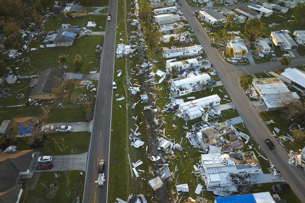 Damaged mobile homes after hurricane Ian in Florida residential area