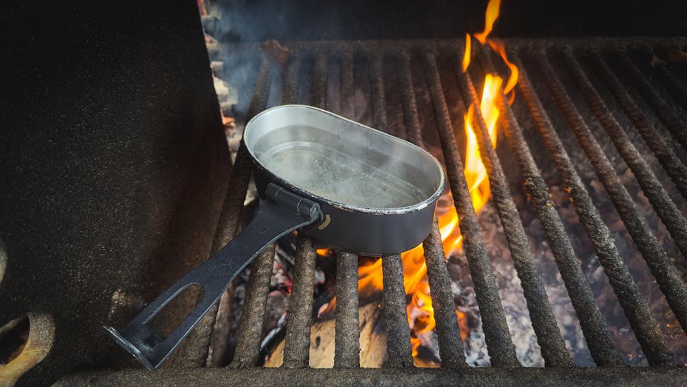 Boiling water in a metal pan