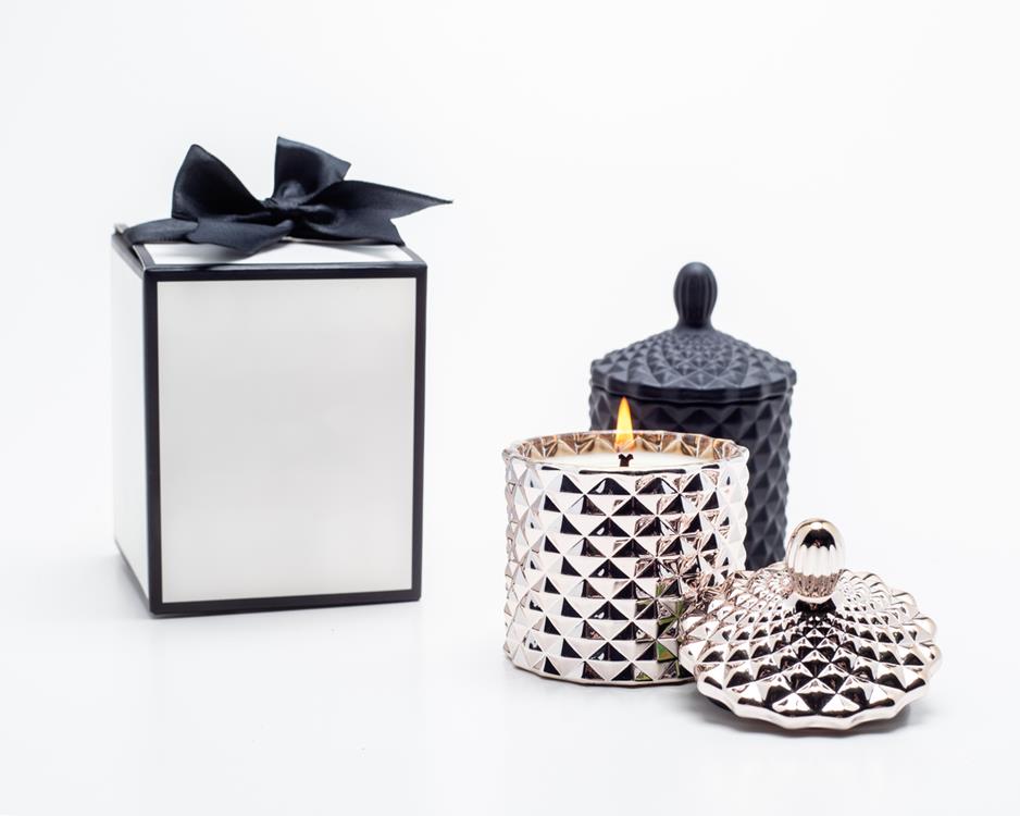 Candles in rose gold and black jars