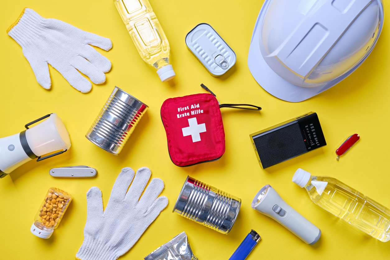 Disaster preparedness kit on yellow background