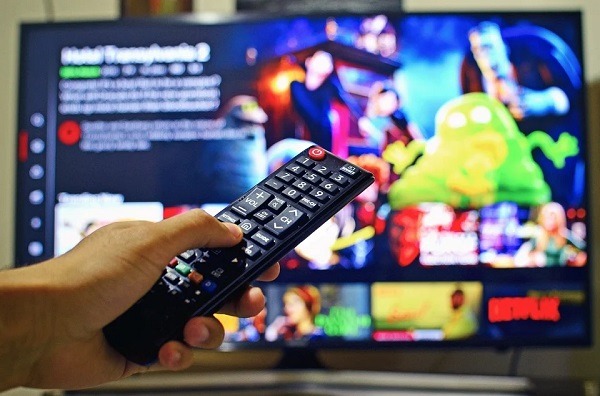 watching television using a remote