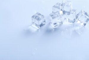 Ice cubes on a white surface